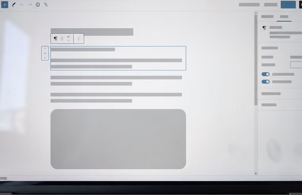 The WordPress block editor open on a laptop while building a course sales page